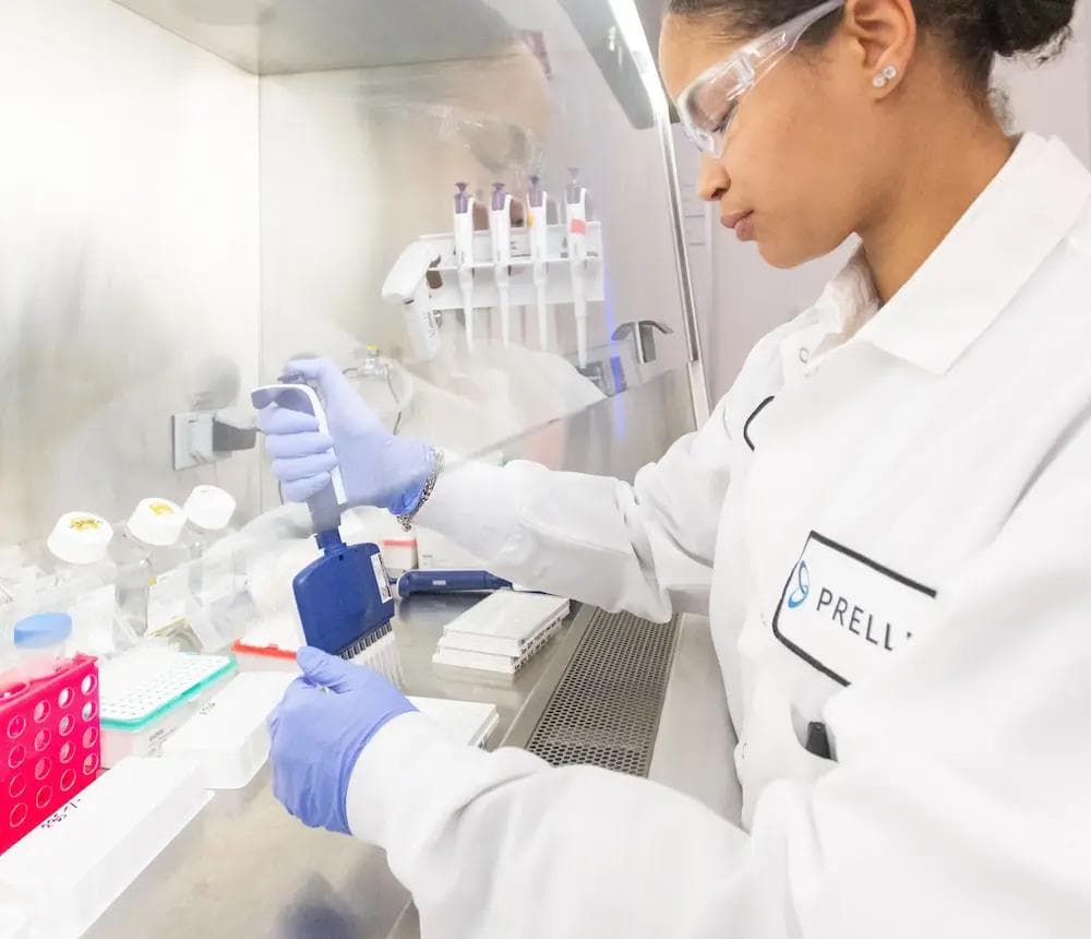 Scientist with microscope